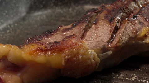 Cooking t-bone steak on the grill: closeup footage Stock-Footage 61355014