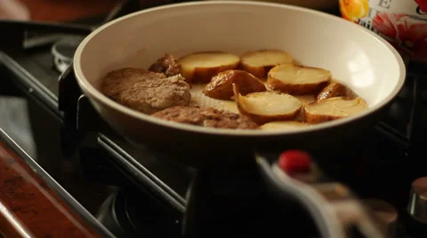 Cooking Tasty Potatoes &amp; Сutlets Stock Footage 36671241