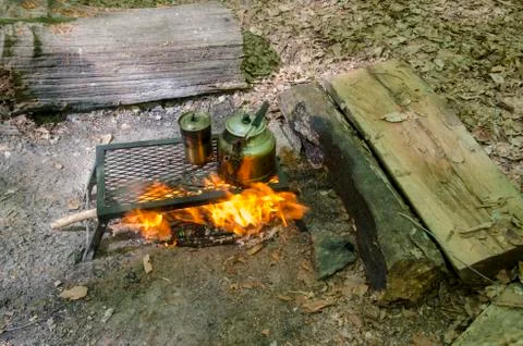 Cooking Tea in Camping Stock Photos