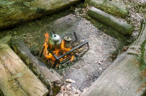Cooking Tea in Camping Stock Photos