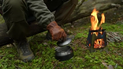 Cooking tea in the field Видео 294582326