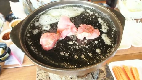 Cooking Thai barbecue buffet, grilled sliced pork, beef on hot pan with butter 스톡 동영상 83917536