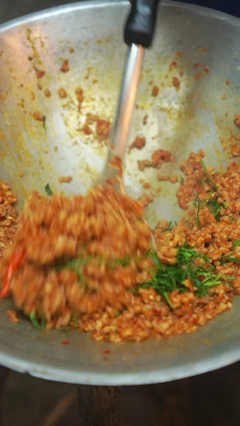 Cooking Thai stir-fried minced fish with spicy red curry paste. Stock-Footage 336629966