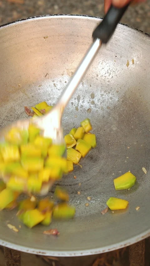 Cooking Thai stir-fried pumpkin with pork slices. Stock Footage 336203341