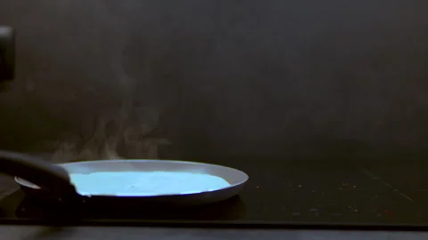 Cooking Thin Pancake Batter In Hot Frying Pan With Steam Stock Footage 328290566
