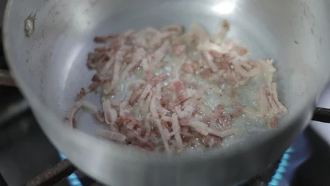 Cooking Thin Slices Of Bacon Stock Footage 129338281