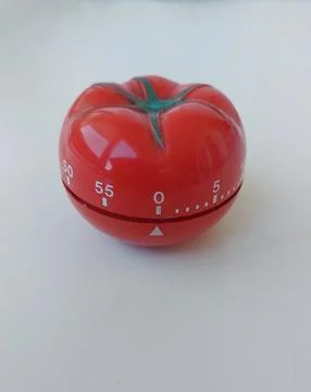 Cooking timer Tomato shaped Stock Photos