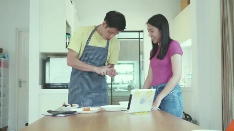 Cooking Together: A Fun Culinary Experience Stock Footage 314221713