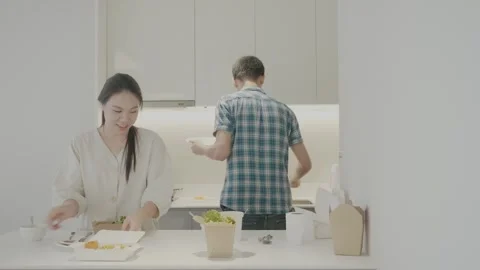 Cooking Together in a Modern Kitchen Stock Footage 314570176