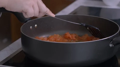 Cooking Tomatoes in Pan Stock Footage 96429865