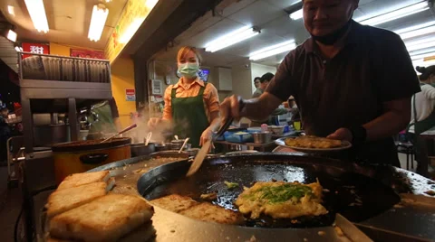 Cooking turnip cakes Stock Footage 34522035