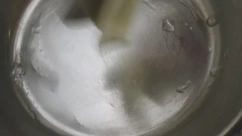 Cooking tutorial is taking place in a miniature kitchen showcasing the use of Video stock 286900147