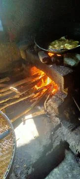 Cooking using firewood Stock Photos