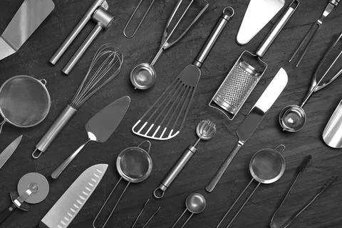 Cooking utensils on black table, flat lay Foto stock