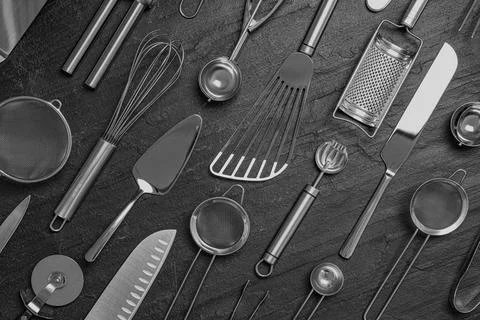 Cooking utensils on black table, flat lay Foto stock