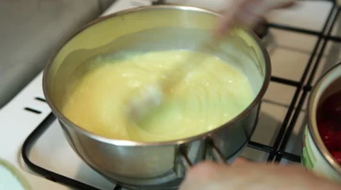 Cooking vanilla pudding Stock Footage 58212530