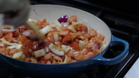 Cooking vegetable in a cast iron pan, home cooking, 4k, real time Stockbeeldmateriaal 252166835