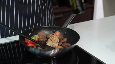 Cooking vegetables and meat Vídeo Stock 50961466
