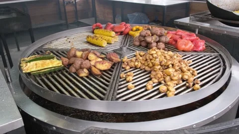 Cooking vegetables grilled outdoors Stock Footage 239079785