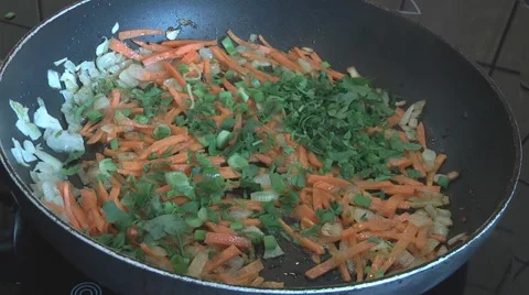 Cooking vegetables in a pan Stock Footage 49824920