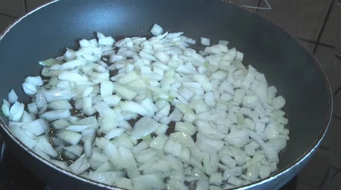 Cooking vegetables in a pan Stock Footage 49825369