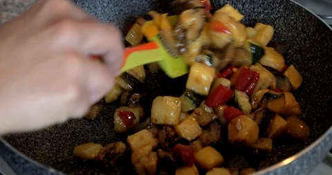Cooking vegetables on a pan Stock Footage 117466205