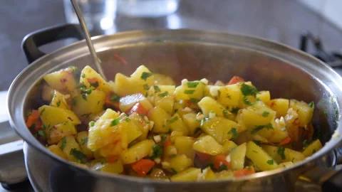 Cooking vegetables in a pan.  Stock Footage 164171655