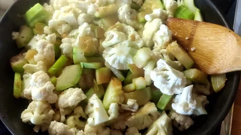 Cooking vegetables in a pan Stock Footage 201295159