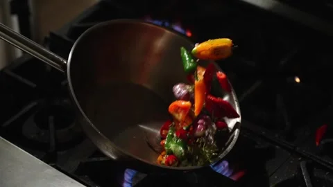 Cooking vegetables in a pan Stock Footage 246965640