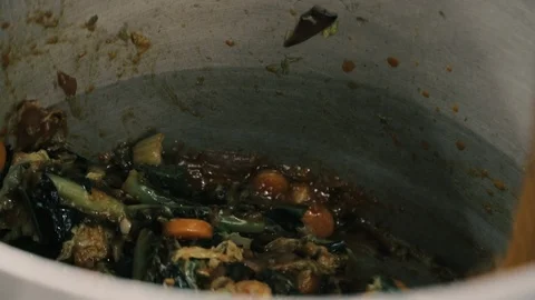 Cooking vegetables in a pot Stock Footage 86391524