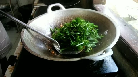 Cooking vegetables on a rainy day is summarized in a video. Stock Footage 219362861