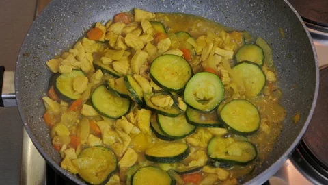 Cooking vegetables in wok Video stock 87304491