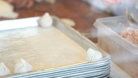 Cooking Video Steps to make Xiao long bao.It is the most popular Chinese dim  Stock Footage 115716155