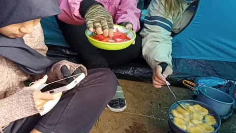 Cooking while camping Stock Footage 260228435