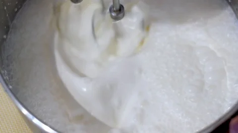 Cooking Whipping Cream In Mixer. Whipped Cream. Closeup. Whipped Cream and Mixer Stock Footage