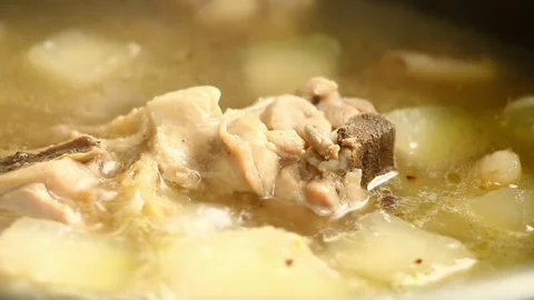 Cooking   winter melon soup with chicken  , in door Chiangmai  Thailand Stock Footage 165038249