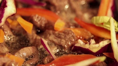 Cooking a wok in slow motion Stock Footage 67863378