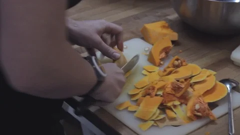 Cooking workshop, setting pumpkin to cook, slider shot Stock Footage 101309286