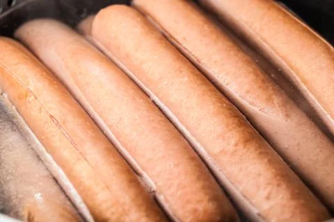 Cooking wurstels Stock Photos