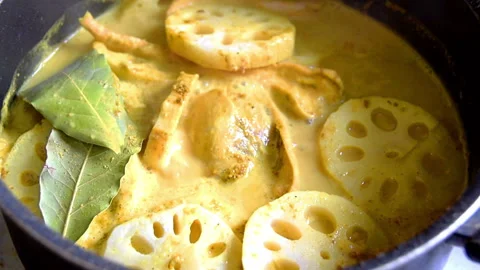 Cooking  yellow curry with lotus root Stock Footage 159065029