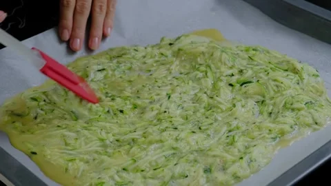 Cooking Zucchini Mixture on Baking Sheet in Kitchen Stock Footage 341427482