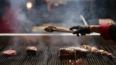 Cooks Grilling Meat in a Restaurant Kitchen Stock Footage 59180388