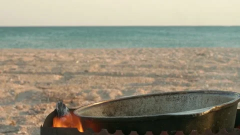 Cook's hands add tomato cut into pieces in a pot on fire. Stock Footage 139964807