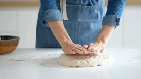 The cook's hands in flour, baker at work, bread and bakery, flour at the kitchen Stock Footage 121527200