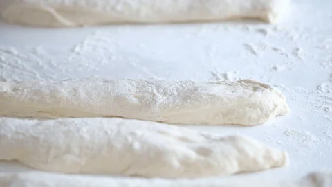 The cook's hands in flour, baker at work, bread and bakery, flour at the kitchen Stock Footage 128255596