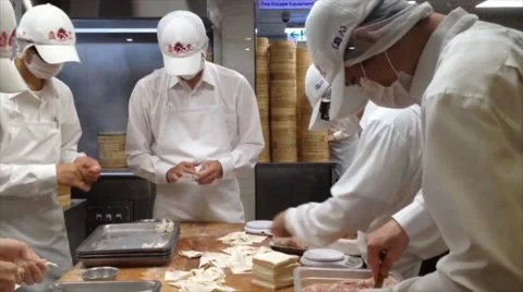 Cooks make taiwanese soup pork dumplings Stock Footage