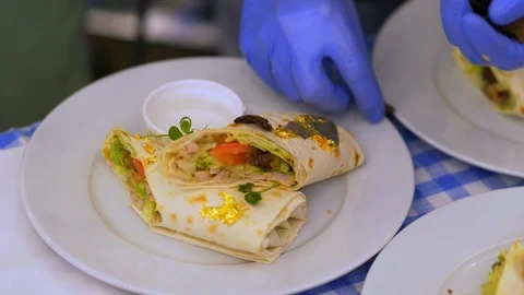 Cooks preparing shawarma with truffle and gold 스톡 동영상 105012203