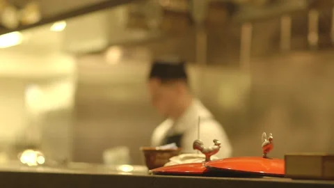 Cooks working on the Line in a Restaurant Kitchen Stock-Footage 141084873