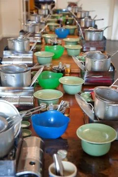 Cookware on long table Stock Photos