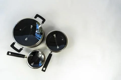 Cookware set, steel dinner set isolated on white background, black metal co.. Stock Photos